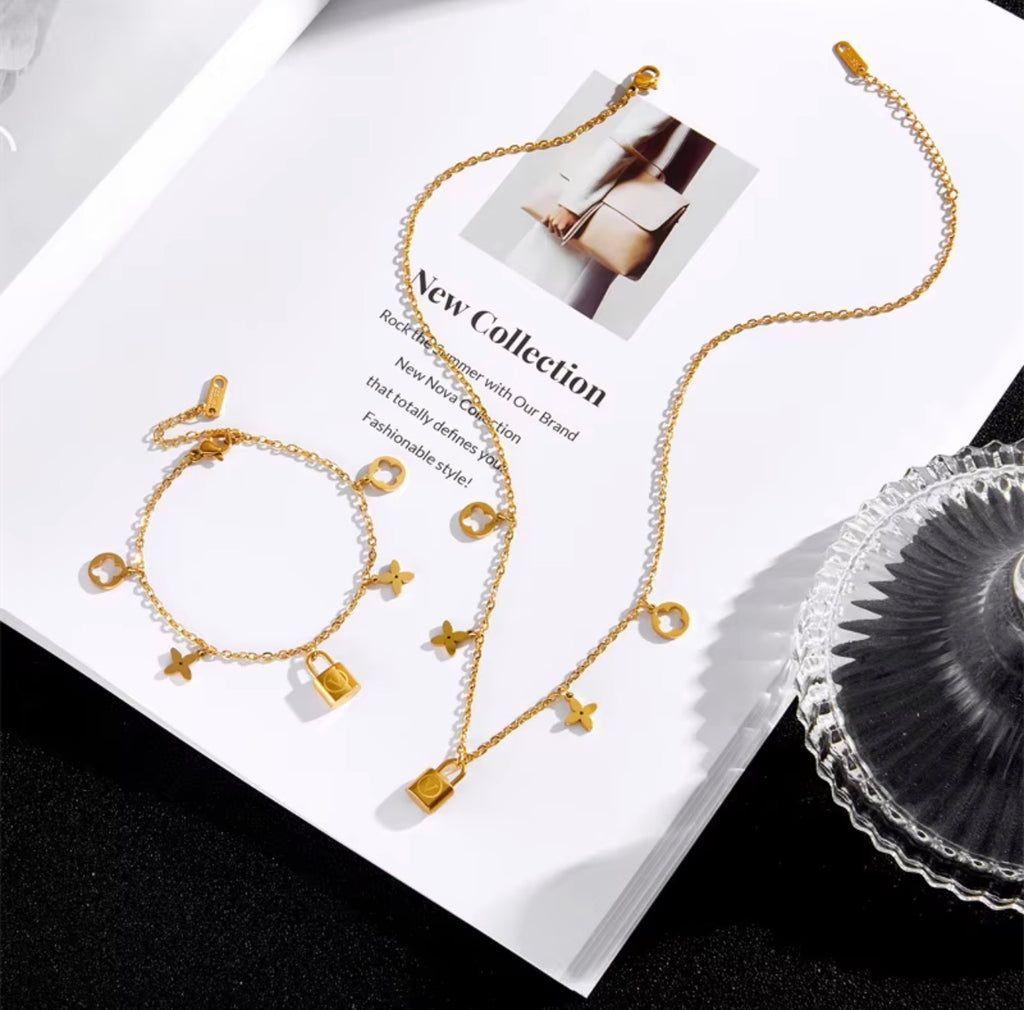 Gold v lock necklace