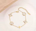 White diamond with gold bracelet