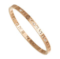 rose gold roman numeral with diamond details