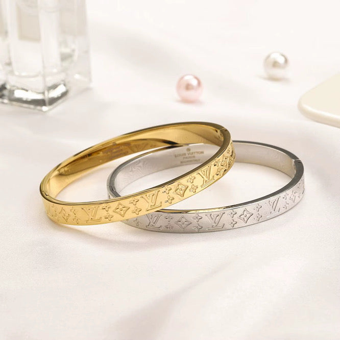Limited gold bangle
